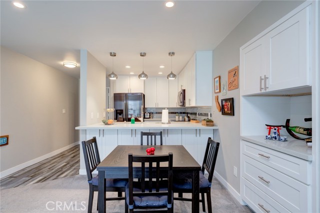 Built in cabinet and drawers in dining area.