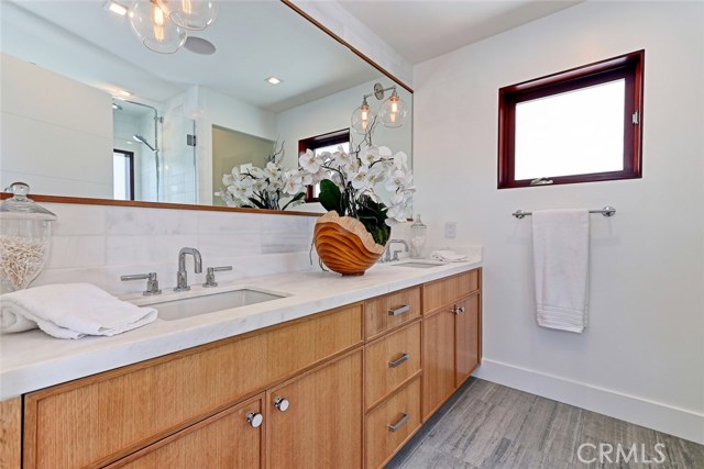 Master bath with marble counter, limestone flooring