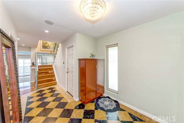 Entry and staircase leading to upper floor