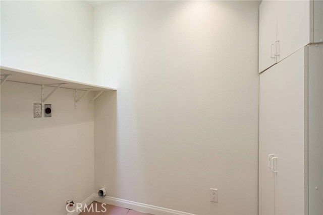 Upstairs laundry room.