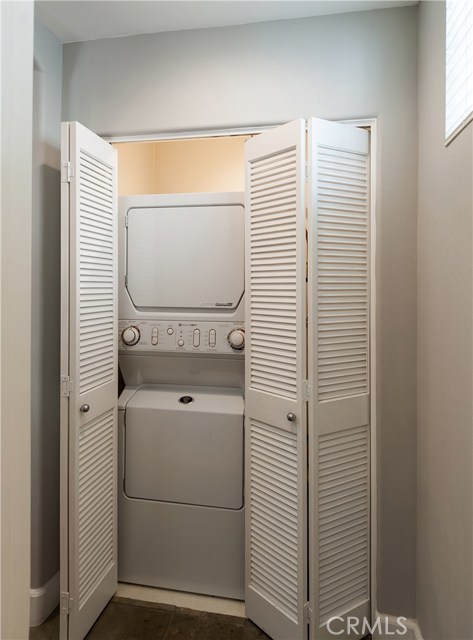 Stackable washer dryer is on the main floor.