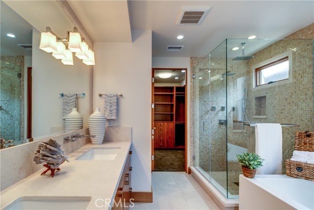 The master bath is your personal spa and offers a soaking tub and walk in shower that lead to a large walk in closet.