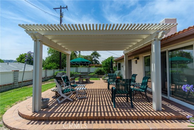 relaxing patio area with pergola