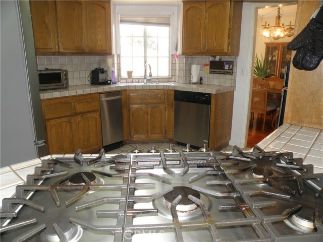 Stainless appliances including a 5 burner gas range