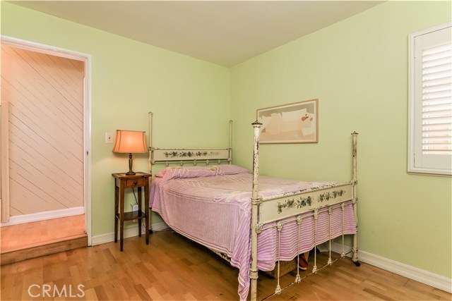 The bedroom has a well sized window and a plantation shutter.