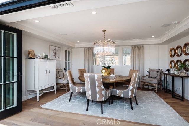 Elegant formal dining room with bi-fold doors