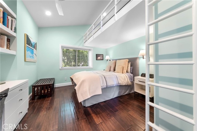 Wonderful bedroom #3 has ladder to loft and built in desk, too!