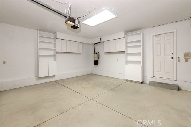 Two car garage with lots of extra storage and built ins.  Direct access to the unit.
