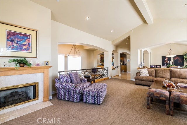 View from the front balcony toward the Dining Room..rear right and central wide hallway to kitchen and family room.