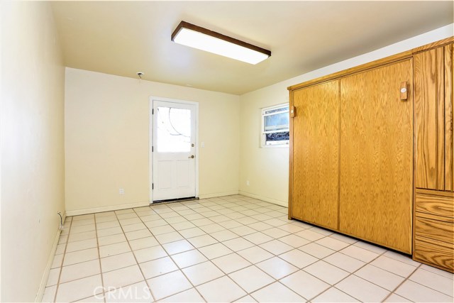 The downstairs separate guest bedroom which has it's own entrance, is well sized and has a built in Murphy Bed system with storage. It will make a great older child's bedroom, an office or a separate guest suite.