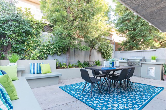 Backyard with custom BBQ and built in seating
