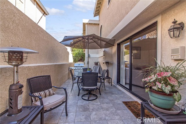 Private side patio leading to the family room.