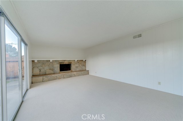 Family Room With Fireplace And Wet bar.