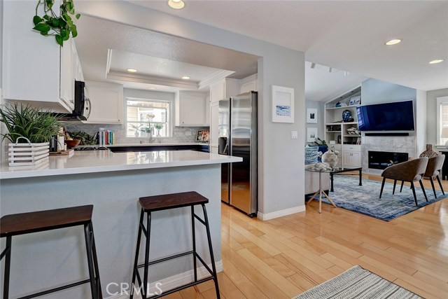 Easy entertaining from kitchen to living room.