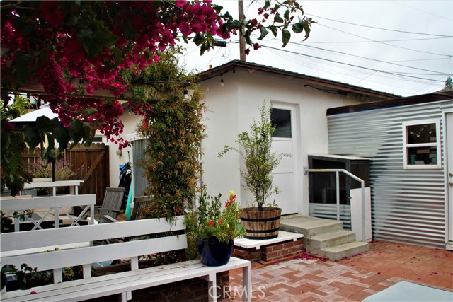 Basically a 2 car detached garage with an "enclosed" laundry room. Said room was not done with permits and is not considered part of the living area of home