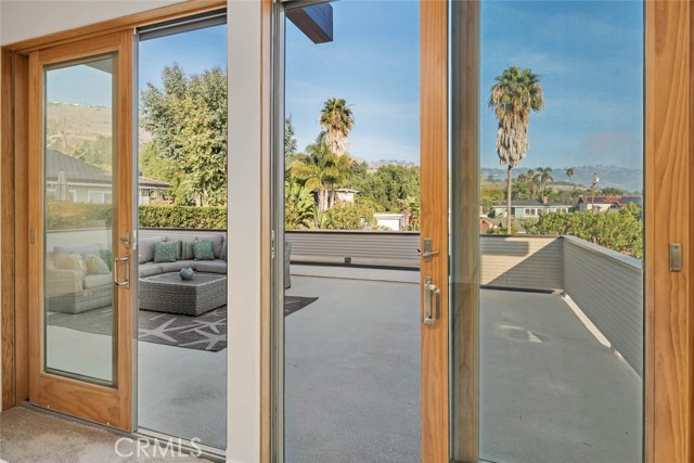 rooftop deck with Palos Verdes hill and ocean views