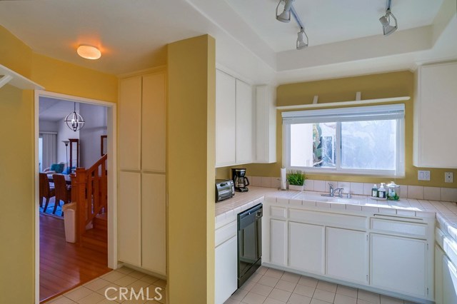 Kitchen pantry and counter space w track lighting