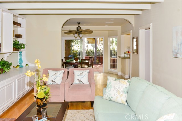 Living room view to the dining room  and Patio area.