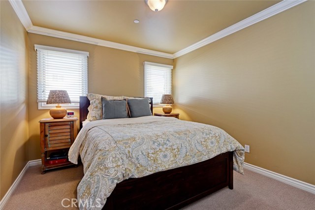 On the main floor this secondary guest bedroom is adjacent to the master bedroom!