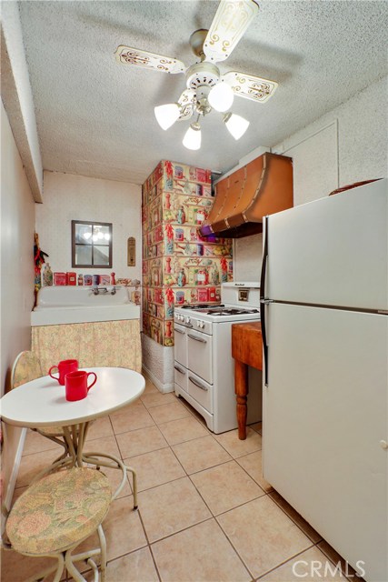 Kitchenette is secondary & on first level. Main kitchen is on the upper level