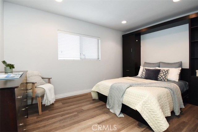 1st bedroom with a Murphy bed