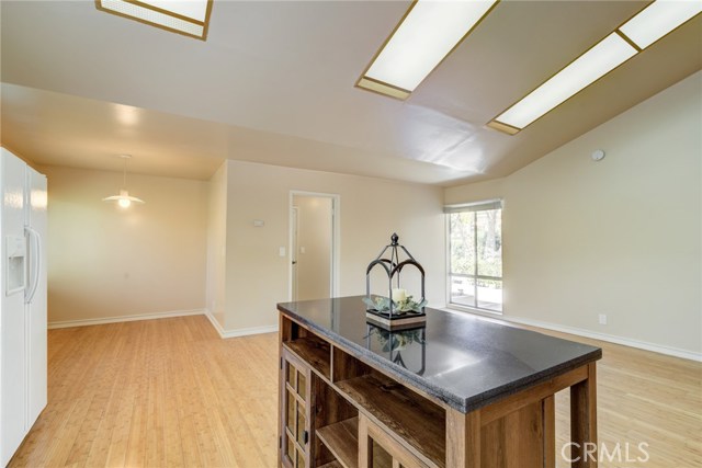 Breakfast nook and Family room with vaulted ceiling