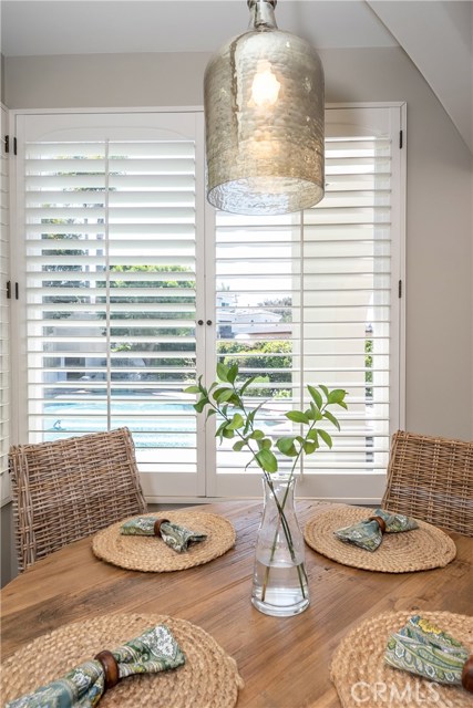 Breakfast nook overlooking backyard pool