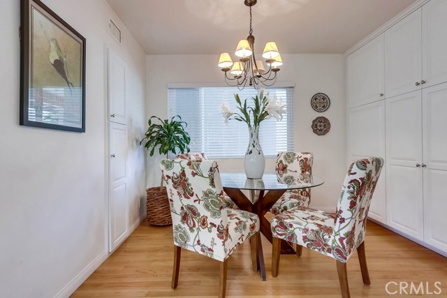 notice all the cabinets added in this eat in area of the kitchen