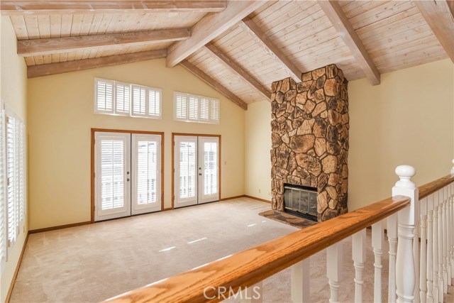 The raised dining room looks out onto the open bright living room.