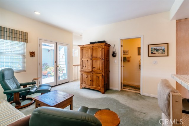 Upstairs den leading to another great deck area.