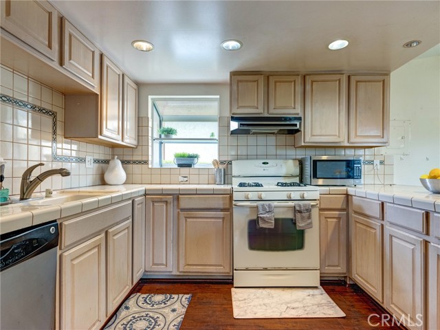 An open kitchen with peninsula provides the chef in the family with everything they need to home cook great meals!