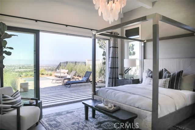Master suite opens to private back yard and views.