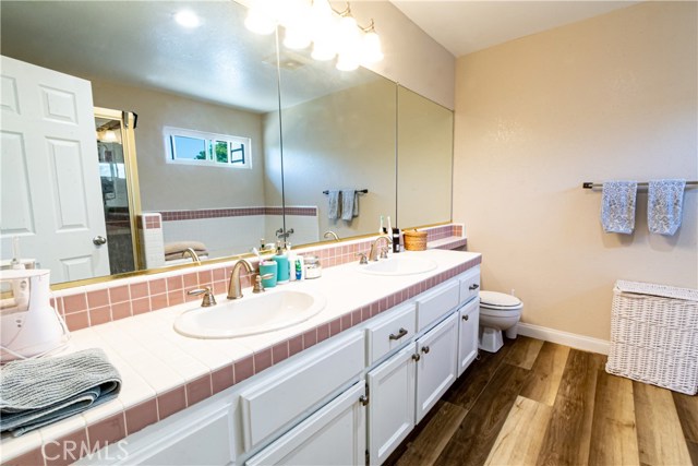 Grandest bathroom with double sinks and separate soaking tub and shower