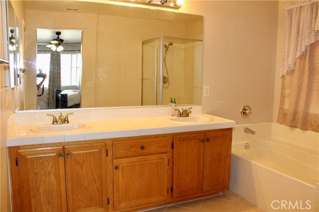 Master bedroom toilet with tile flooring, super clean