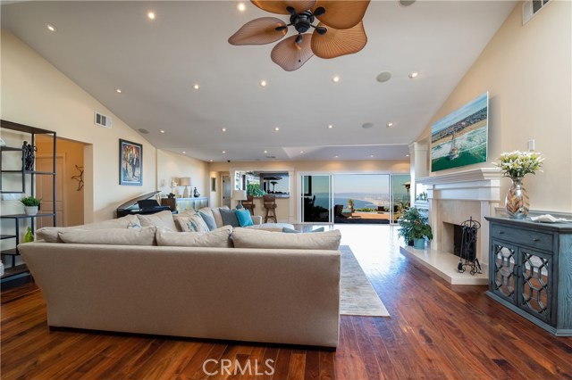 Living room with tall ceilings opens onto the spectacular view. The view is just as amazing at night!