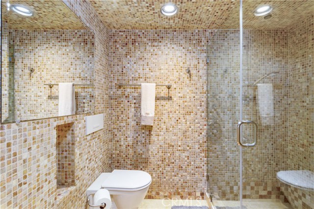 Bath with exquisite high end tile handiwork and materials