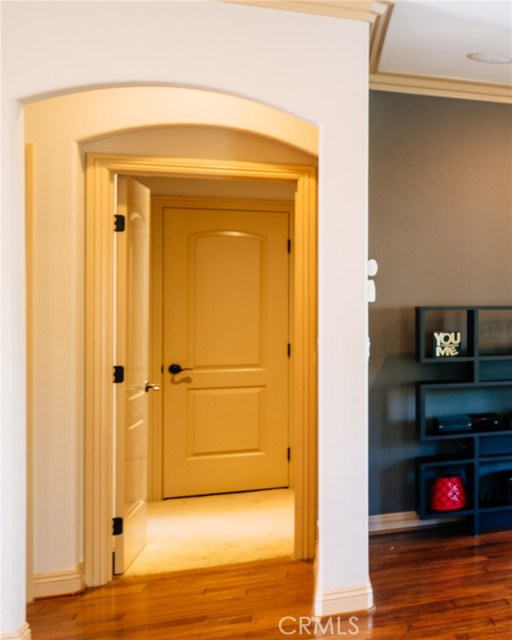 The archways in the home give it character and charm. This is the doorway to the master suite, laundry, and guest bath.