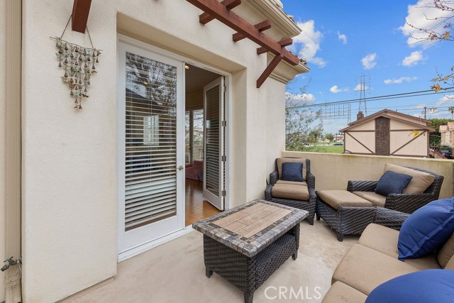 French doors open to the balcony (with gas bbq hook-ups) adding more living spaces