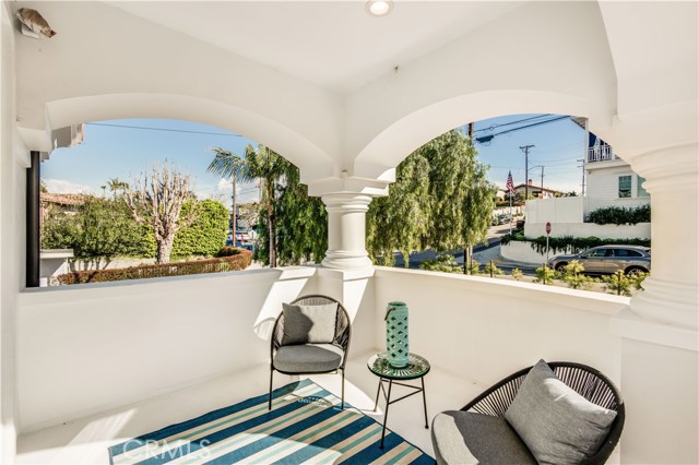 This is the balcony off of the south bedroom. Enjoy sunrise with your cup of coffee or sunsets with your favorite beverage all year long from this spacious patio.