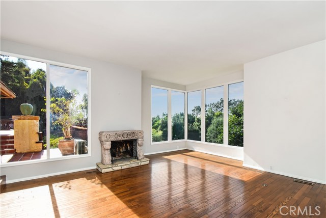 Main level living room flooded with natural light.