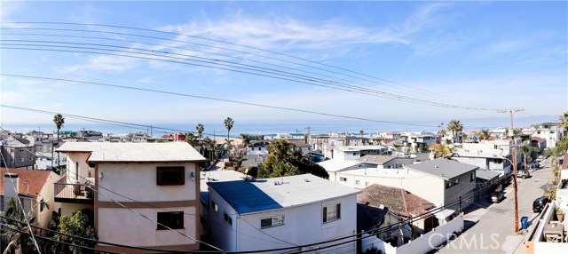 Unblock-able sweeping Southern ocean views all the way to Santa Monica Mountains, Malibu and Point Dume taken from roof to show approximate future view potential.