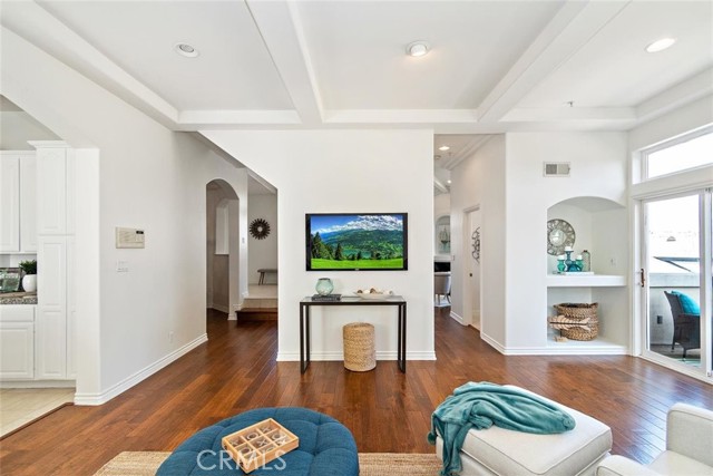Walnut flooring adds beautiful warmth to the space.