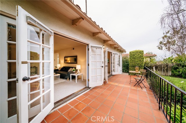 Take pleasure in the mild Palos Verdes climate, with French doors at the family room that flow onto the veranda, bringing the outdoor living into the home.