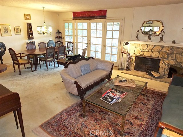 Living Room with Fireplace and Dining Area