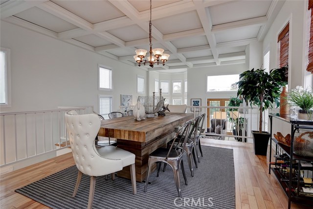 Elevated dinning room with refinished hardwood floors.