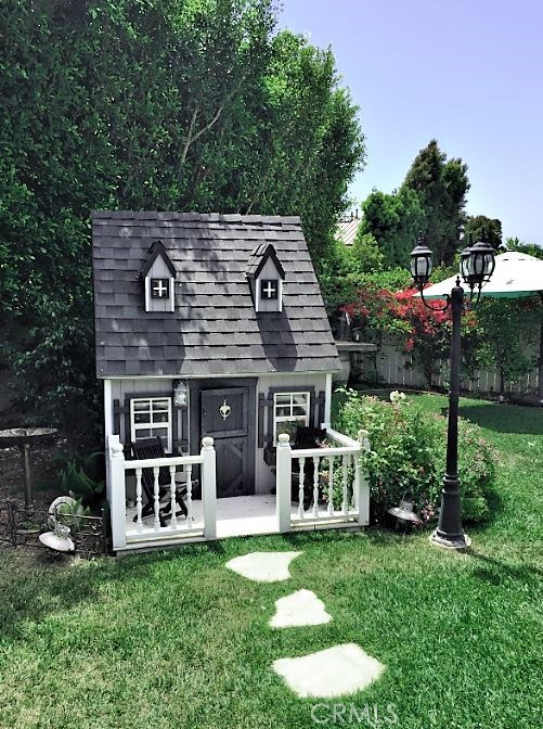 custom child's playhouse equipped with electricity