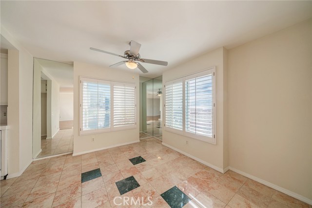 Bright Dining area with plantation shutters offer Catalina and Ocean views.