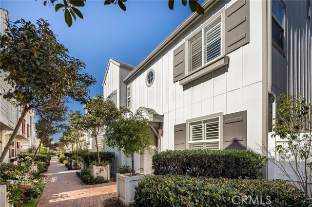 No cars up here near the houses! All of the parking is in a gated parking structure at street level. Your two assigned parking spots (and a storage unit!) are just a few houses down the path and down to the garage.