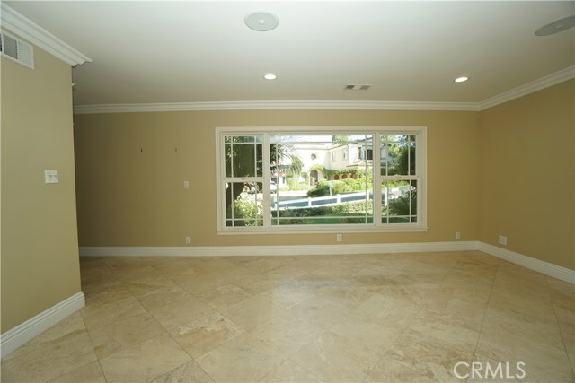 Living room looks out to neighborhood. Double pane windows throughout.