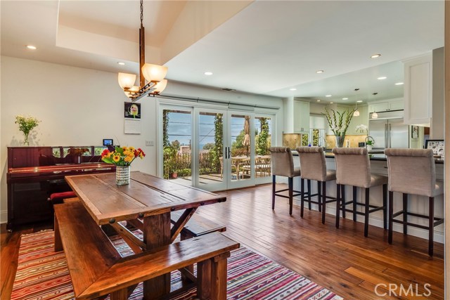 Open floorplan with bar top in the kitchen to enjoy social cooking and the view